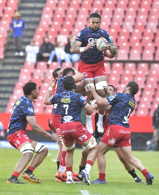 110525 - Emirates Lions v Scarlets - United Rugby Championship -  Sam Lousi of Scarlets wins possession