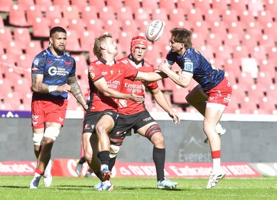 110525 - Emirates Lions v Scarlets - United Rugby Championship - Richard Kriel of the Lions fights for possession with Ellis Mee of Scarlets