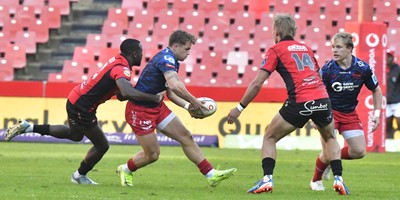 110525 - Emirates Lions v Scarlets - United Rugby Championship - Macs Page of Scarlets with the ball