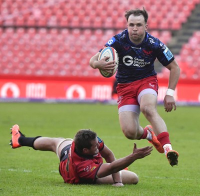 110525 - Emirates Lions v Scarlets - United Rugby Championship - Ioan Lloyd of Scarlets with the ball