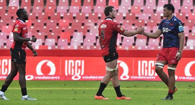 110525 - Emirates Lions v Scarlets - United Rugby Championship - Players shake hands at the end of the match