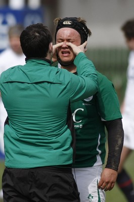 06.04.10 England U18 v Ireland U18 - Under 18s 5 Nations Festival -  Ireland's Kyle McCall receives treatment for a head injury. 