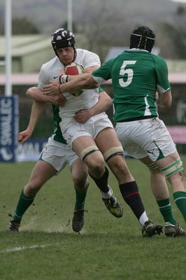 06.04.10 England U18 v Ireland U18 - Under 18s 5 Nations Festival -  England's Sam  Twomey is tackled by Ireland's Luke McGrath & Jack Conan(5). 