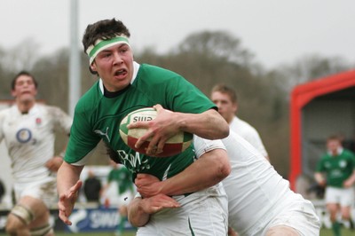 06.04.10 England U18 v Ireland U18 - Under 18s 5 Nations Festival -  Ireland's Aaron Thomas looks for support as England's Jamie Elliott makes the tackle. 