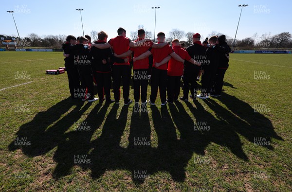 200322 England U18 v Wales U18, Under 18 International Match - Wales U18 team members huddle together as they arrive at Taunton RFC ahead of the match