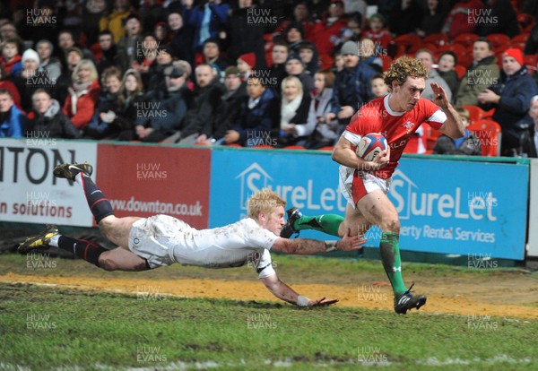 05.02.10 - Six Nations under 20 Championship, England under 20 v Wales under 20 Wales' James Loxton beats England's Tom Catterick on his way to score a try 