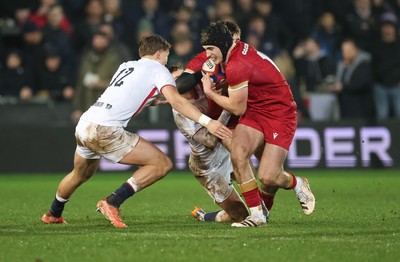 060226 - England U20 v Wales U20, 2026 U20 Six Nations - Osian Darwin-Lewis of Wales takes on Will Knight of England
