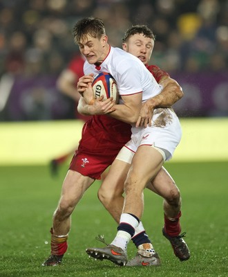 060226 - England U20 v Wales U20, 2026 U20 Six Nations - James Pater of England is held by Tom Bowen of Wales