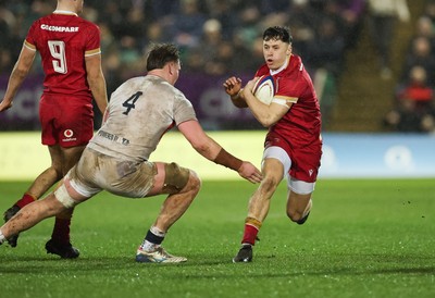 060226 - England U20 v Wales U20, 2026 U20 Six Nations - Jack Woods of Wales takes on Elliot Williams of England