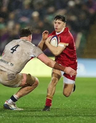 060226 - England U20 v Wales U20, 2026 U20 Six Nations - Jack Woods of Wales takes on Elliot Williams of England