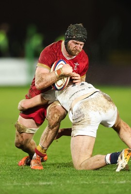 060226 - England U20 v Wales U20, 2026 U20 Six Nations - Evan Minto of Wales is tackled by George Pearson of England