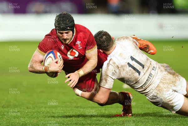 060226 - England U20 v Wales U20, 2026 U20 Six Nations - Evan Minto of Wales is tackled by George Pearson of England