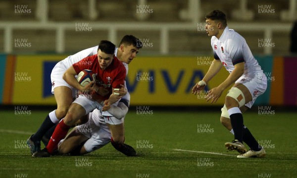 090218 - England U20 v Wales U20 - NatWest 6 Nations - Callum Carson of Wales is brought down