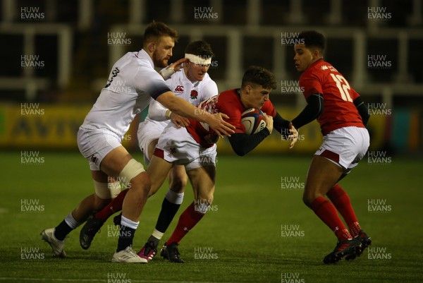 090218 - England U20 v Wales U20 - NatWest 6 Nations - Sam Moore and James Grayson of England tackle Tomi Lewis of Wales