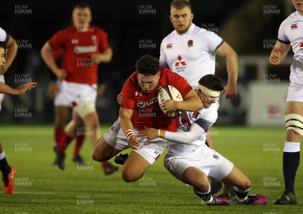090218 - England U20 v Wales U20 - NatWest 6 Nations - Rio Dyer of Wales is tackled by James Grayson of England