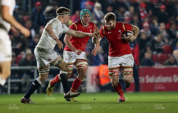 110316 - England U20 v Wales U20 - RBS 6 Nations - Tom Phillips of Wales is challenged by Lewis Boyce of England