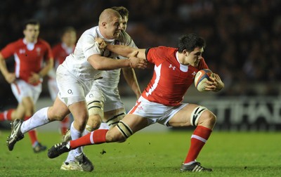 240212 - England Under 20 v Wales Under 20 - Under 20 Six Nations -Ellis Jenkins of Wales is tackled by Koree Britton of England