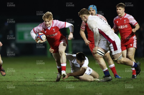 250222 - England U20s v Wales U20s U20s Six Nations Championship 2022 - Harri Houston of Wales is tackled by Toby Knight of England