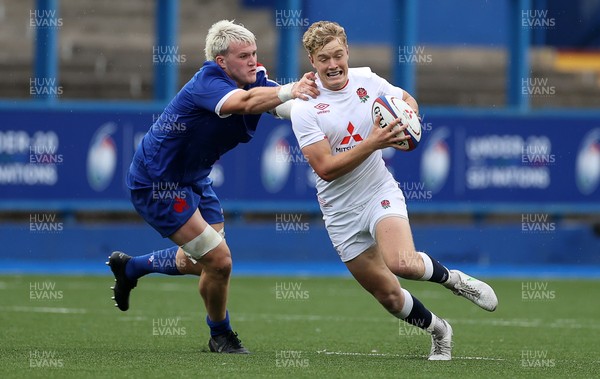 190621 - England U20s v France U20s - U20s 6 Nations Championship - Fin Smith of England is tackled by Joshua Brennan of France