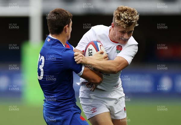 190621 - England U20s v France U20s - U20s 6 Nations Championship - Fin Smith of England is tackled by Alfred Parisien of France
