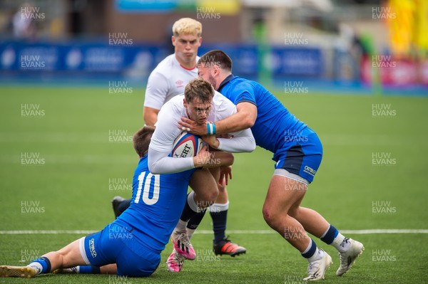 130721 - England U20 v Italy U20 - Under 20 Six Nations  - Tom Roebuck of England is tackled by Mattia Ferrarin of Italy and Fabio Schiabel of Italy