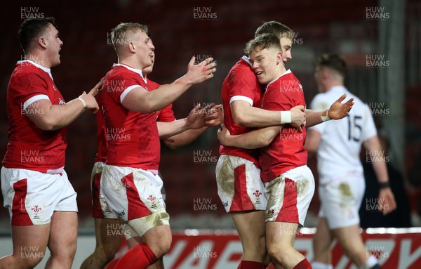 060320 - England U20s v Wales U20s - U20s 6 Nations Championship - Sam Costelow of Wales celebrates scoring a try with team mates