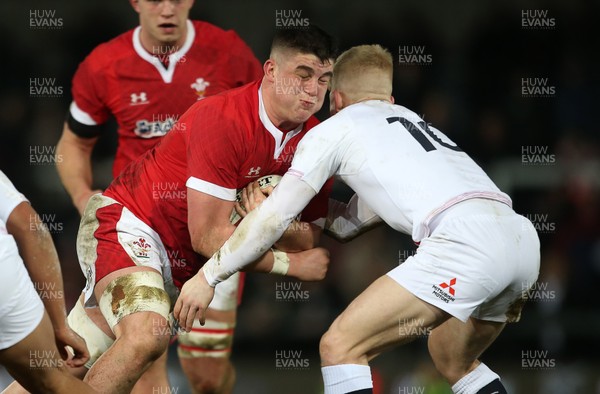 060320 - England U20s v Wales U20s - U20s 6 Nations Championship - Morgan Strong of Wales is tackled by George Barton of England