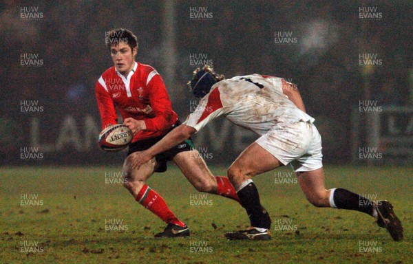 030206 - England U21 v Wales U21 - Six Nations -  Andrew Bishop of Wales tries to beat Michael Hills