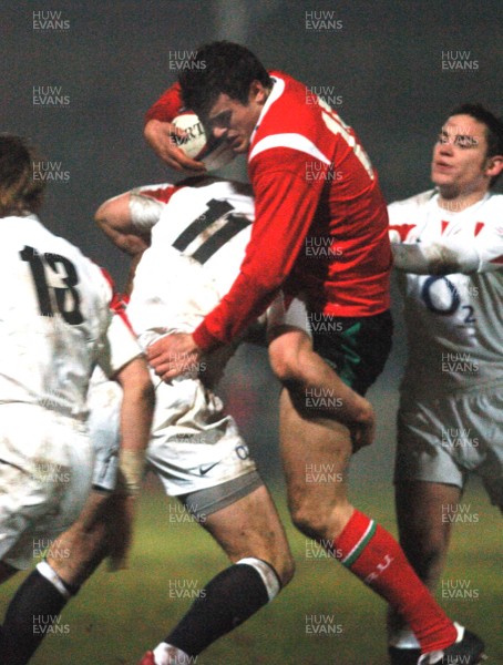 030206 - England U21 v Wales U21 - Six Nations -  Jamie Roberts of Wales is tackled by Mike Brown