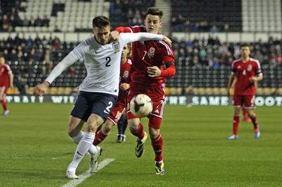 050314 - England U'21's vs Wales U'21's -UEFA U'21's Qualifying Group One-Carl Jenkinson of England holds off Tom Lawrence of Wales(c) Huw Evans Agency