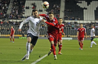 050314 - England U'21's vs Wales U'21's -UEFA U'21's Qualifying Group One-Carl Jenkinson of England holds off Tom Lawrence of Wales(c) Huw Evans Agency