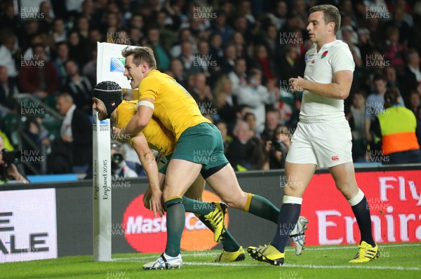 031015 - England v Australia, Rugby World Cup 2015 - Matt Giteau of Australia and Bernard Foley of Australia celebrate after he scores a try