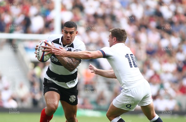 270518 - England v Barbarians - Quilter Cup - Josh Matavesi of Barbarians takes on George Ford of England