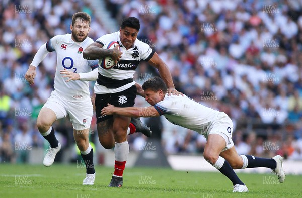 270518 - England v Barbarians - Quilter Cup - Malakai Fekitoa of Barbarians takes on Ben Youngs of England