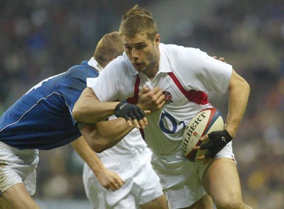 150203 - England v France - Six Nations Championship - England Left wing Ben Cohen gets caught by his opposite number, Aurelien Rougerie