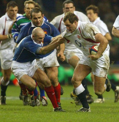 150203 - England v France - Six Nations Championship - England No8 Richard Hill gets grabbed by French outside half Gerald Merceron