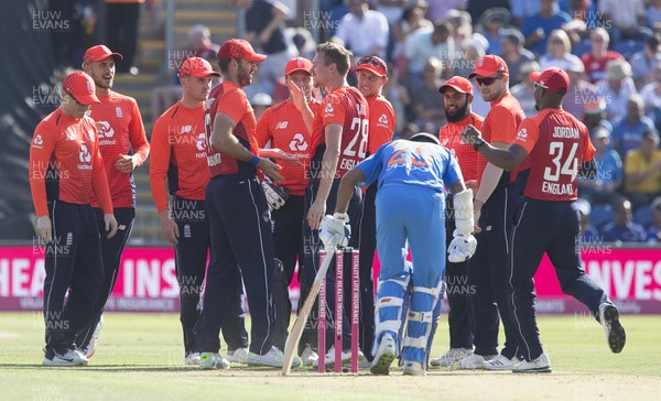 060718 - England v India - International T20 - Jake Ball of England celebrates with team mates after Rohit Sharma is caught