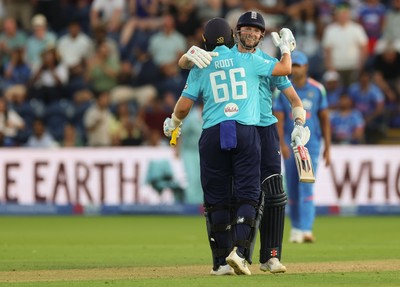 160726 - England v India, Second Metro Bank One Day International, Cardiff - Gus Atkinson of England and Joe Root of England embrace after Atkinson hits the winning runs