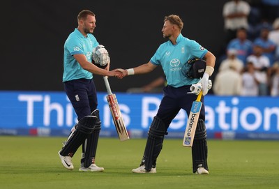 160726 - England v India, Second Metro Bank One Day International, Cardiff - Gus Atkinson of England and Joe Root of England leave the pitch after England win the match