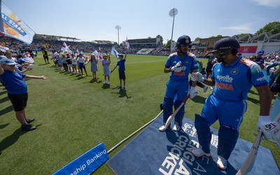 160726 - England v India, Second Metro Bank One Day International, Cardiff - Shubman Gill of India and Rohit Sharma of India take to the pitch for the start of play