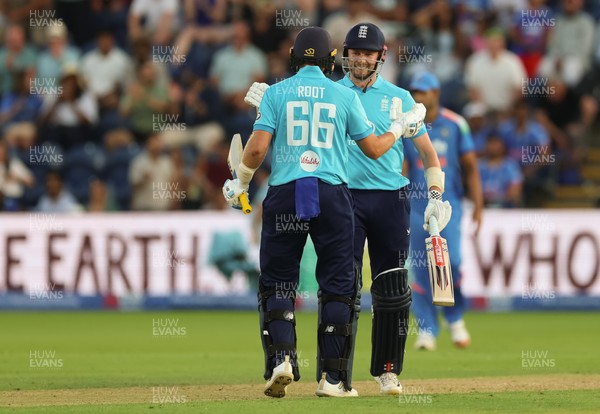 160726 - England v India, Second Metro Bank One Day International, Cardiff - Gus Atkinson of England and Joe Root of England embrace after Atkinson hits the winning runs