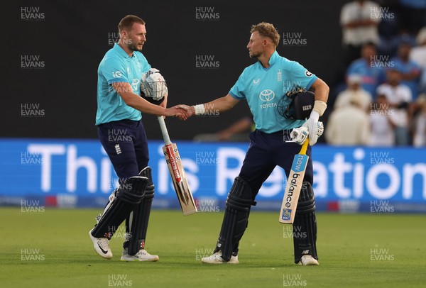 160726 - England v India, Second Metro Bank One Day International, Cardiff - Gus Atkinson of England and Joe Root of England leave the pitch after England win the match