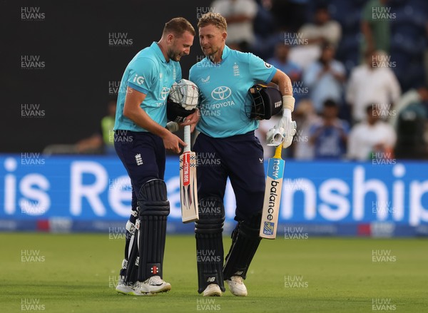 160726 - England v India, Second Metro Bank One Day International, Cardiff - Gus Atkinson of England and Joe Root of England leave the pitch after England win the match