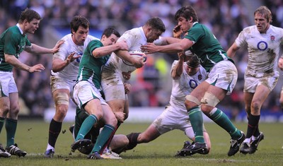 27.02.10 - England v Ireland - RBS Six Nations 2010 - Nick Easter of England is tackled by Jonathan Sexton and Donncha O'Callaghan of Ireland. 