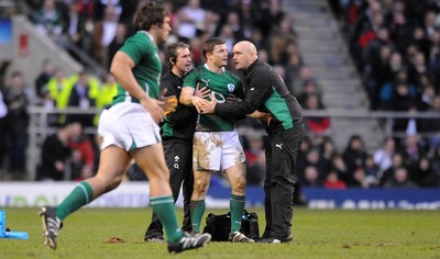 27.02.10 - England v Ireland - RBS Six Nations 2010 - Brian O'Driscoll of Ireland is helped to the ground by medical staff. 