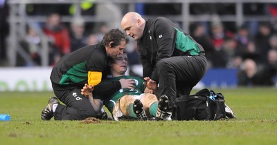 27.02.10 - England v Ireland - RBS Six Nations 2010 - Brian O'Driscoll of Ireland is helped to the ground by medical staff. 