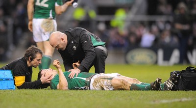 27.02.10 - England v Ireland - RBS Six Nations 2010 - Brian O'Driscoll of Ireland is treated by medical staff. 