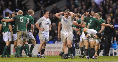 27.02.10 - England v Ireland - RBS Six Nations 2010 - Tim Payne of England looks dejected as Ireland players celebrate. 