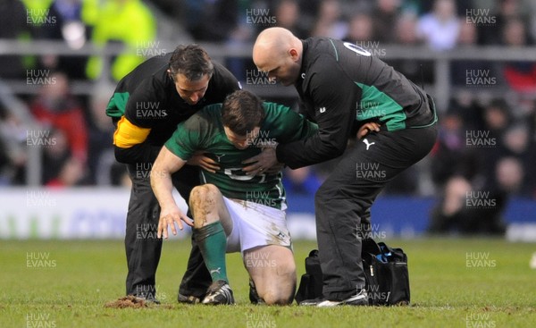 27.02.10 - England v Ireland - RBS Six Nations 2010 - Brian O'Driscoll of Ireland is helped to the ground by medical staff. 