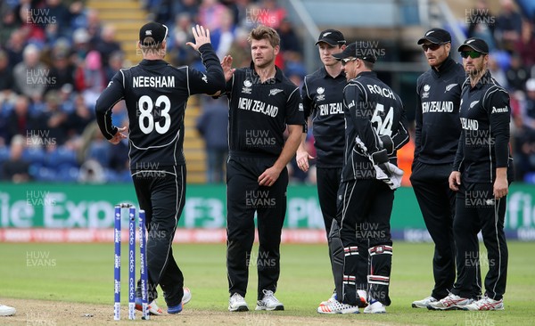 060617 - England v New Zealand - ICC Champions Trophy - Corey Anderson of New Zealand celebrates with  James Neesham after bowling out Joe Root of England